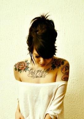 LOVE the roses on the shoulders.  Collar tattoo reads “odi Et amo ” in Latin and translates ” I hate and I love”  Loooovely