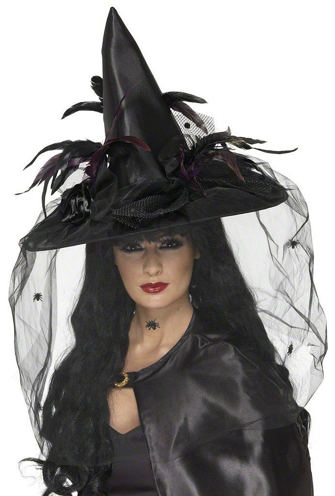 scattered spiders crawling around the perimeter for a dramatic look. Our Deluxe Black Witch Hat with Veil will beautifully
