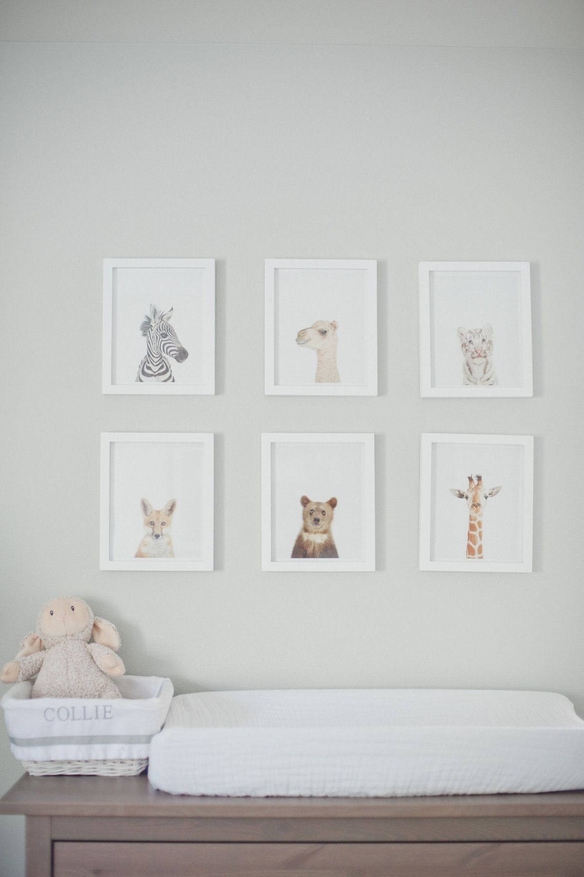 Soft animal prints above the changing table
