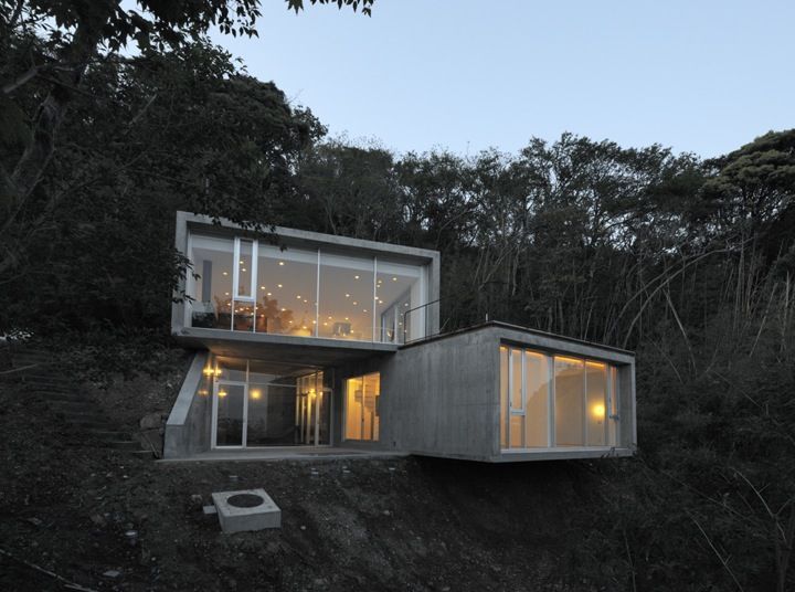 The A House in Kisami built by Florian Busch Architects is a private retreat overlooking the ocean about 180 km south of Tokyo.