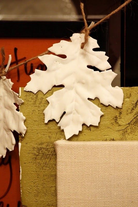 these stylish leaves are fabric ones from the dollar store… dipped into plaster of paris. FABulous idea for garlands, wreaths,