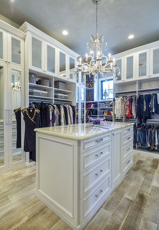 This extra tall custom closet organizer by #closetfactory maximizes the height of the walk-in closet and in style. The room