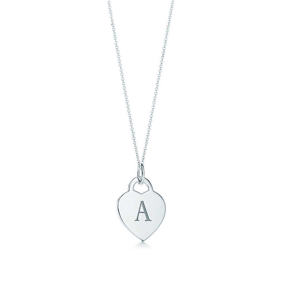 Tiffany Co. - Alphabet heart tag letter charm in silver on a chain. Letters A-Z available.