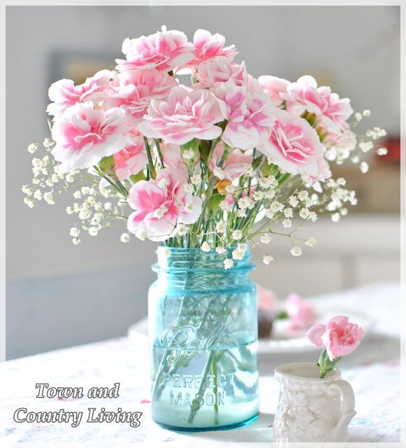 Tips for arranging flowers! Pink Carnations in a blue mason jar – I LOVE CARNATIONS!!!!!!!!!!!!!!!!!!!!!!!  Ted for the wedding