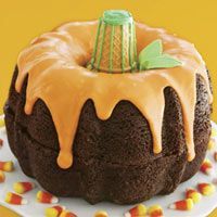 Two Bundt Cakes Together With An Ice Cream Cone Stem…fun pumpkin and what a statement it will make on your dessert table!