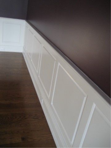 Wainscot is usually the bottom 36″ of the wall. It can be beaded plywood, raised panels, wood squares with a molding in the middle