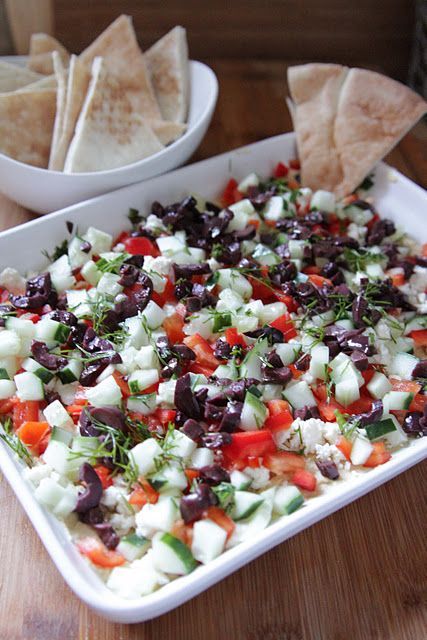 We’ve all made layered Mexican dip… How about layered GREEK dip!!  YUM!!