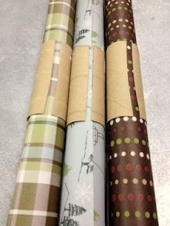 Awesome idea, use papertowel rolls to keep wrapping paper from unrolling!