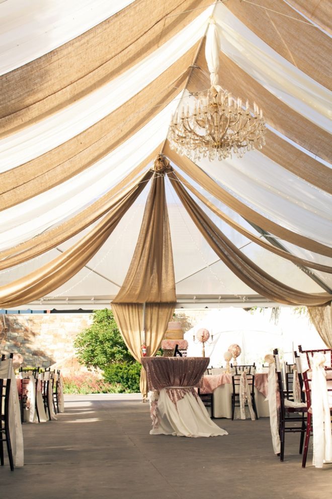 Burlap and linen tent drape! The bride mom DIY-ed this!! Image: Carrie Butler Photography