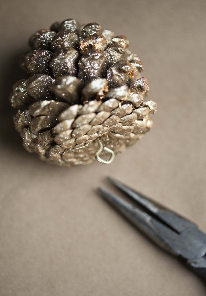 DIY | GLITTER PINE CONE ORNAMENTS (Miss Renaissance)…did these when I was a kid. Easy and fun craft for kids and adults. Spray