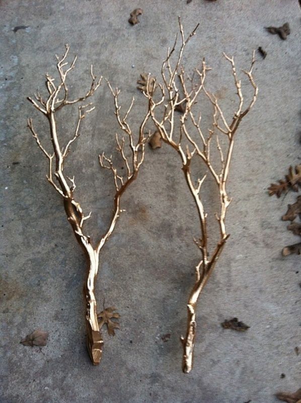 Easiest winter decor ever: give dead branches new life with gold spray paint.