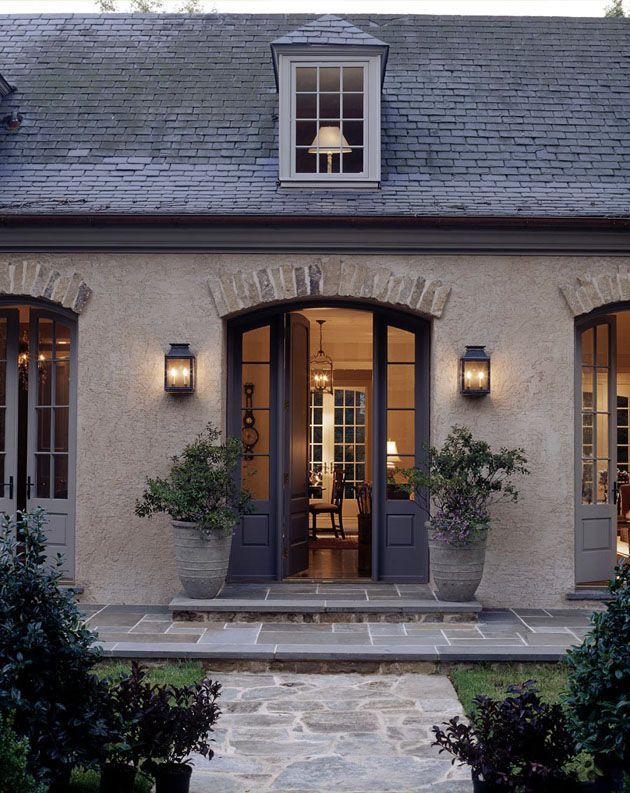 I love this look…French country…old stone, brick trim above doors, color scheme…would love to make our house have a kind of