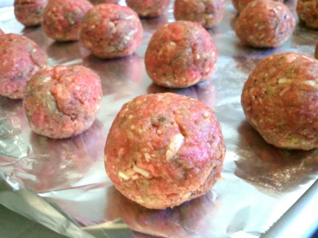 Meatballs and spaghetti 1 pound ground beef   1 small onion, grated   1 egg   1 teaspoon Worcestershire sauce   1/4 cup parmesan