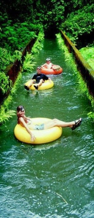 Mountain tubing adventure down the long irrigation ditches of an old sugar plantation in Kauai, Hawaii • photo: courtesy of