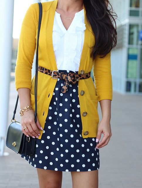 Mustard cardi and navy polka dot skirt accented with a leopard belt. Pretty combo!