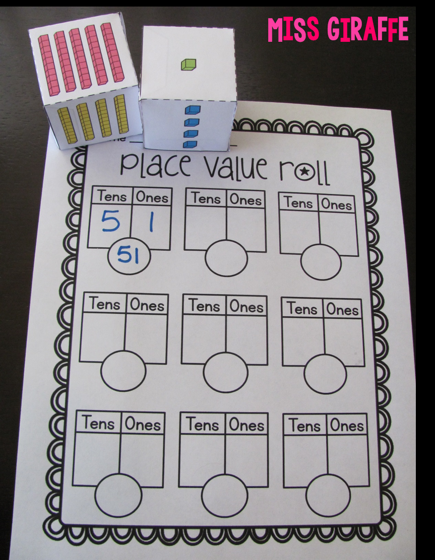 Place value game where students roll the dice to make the base 10 block numbers then write how many tens, ones, and the number