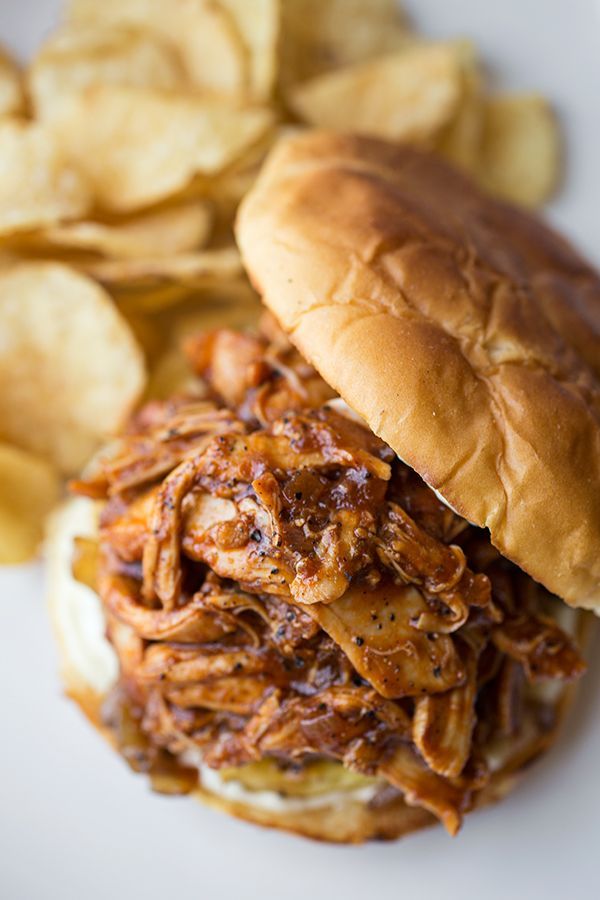 Smoky Hawaiian-BBQ Pulled Chicken Sandwiches on Toasted Hawaiian Buns, with Grilled Pineapple and Maui Onions ~ Delish!