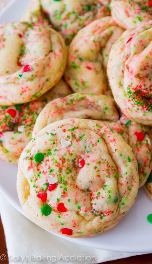 Soft-Baked Christmas Funfetti Cookies! The softest, most festive holiday cookies. Full of sprinkles and buttery goodness!