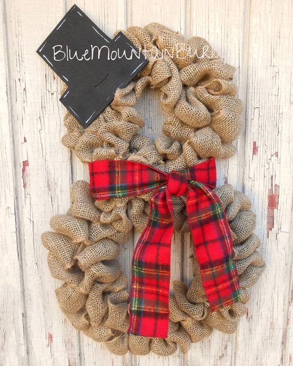 The Snowman Burlap Wreath accented with a beautiful red tartan plaid scarf and a wooden tophat! The perfect addition to your home