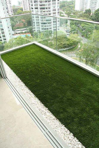 Turn your balcony into a yard with astroturf. | 42 Ingeniously Easy Ways To Hide The Ugly Stuff In Your Home