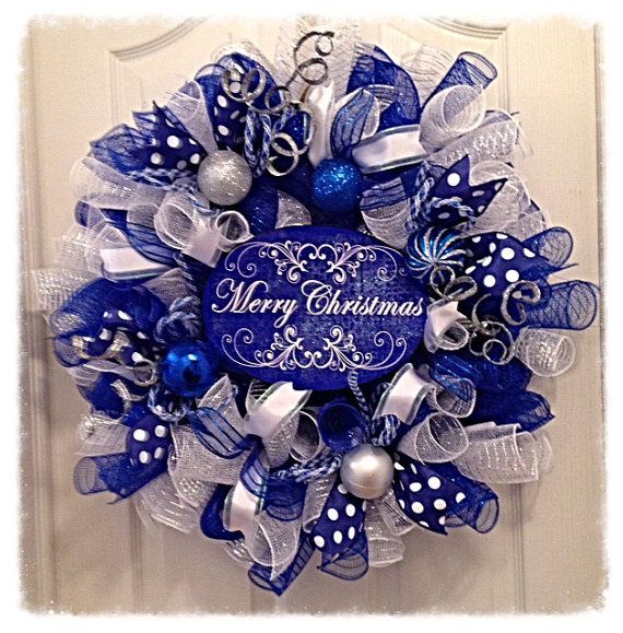 Wow, this beautiful Blue Merry Christmas Wreath will brighten your home this Holiday Season!! It is made with blue, silver and
