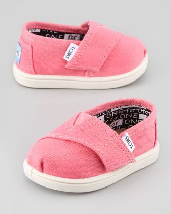 Classic Canvas Slip-On, Pink, Tiny  by TOMS at Neiman Marcus. I just really feel like Adelyn needs these.