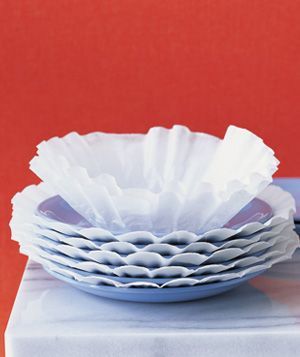 Coffee Filter as Plate Protector ~ Shield stacked china from scratches and nicks by layering a filter between each delicate piece.