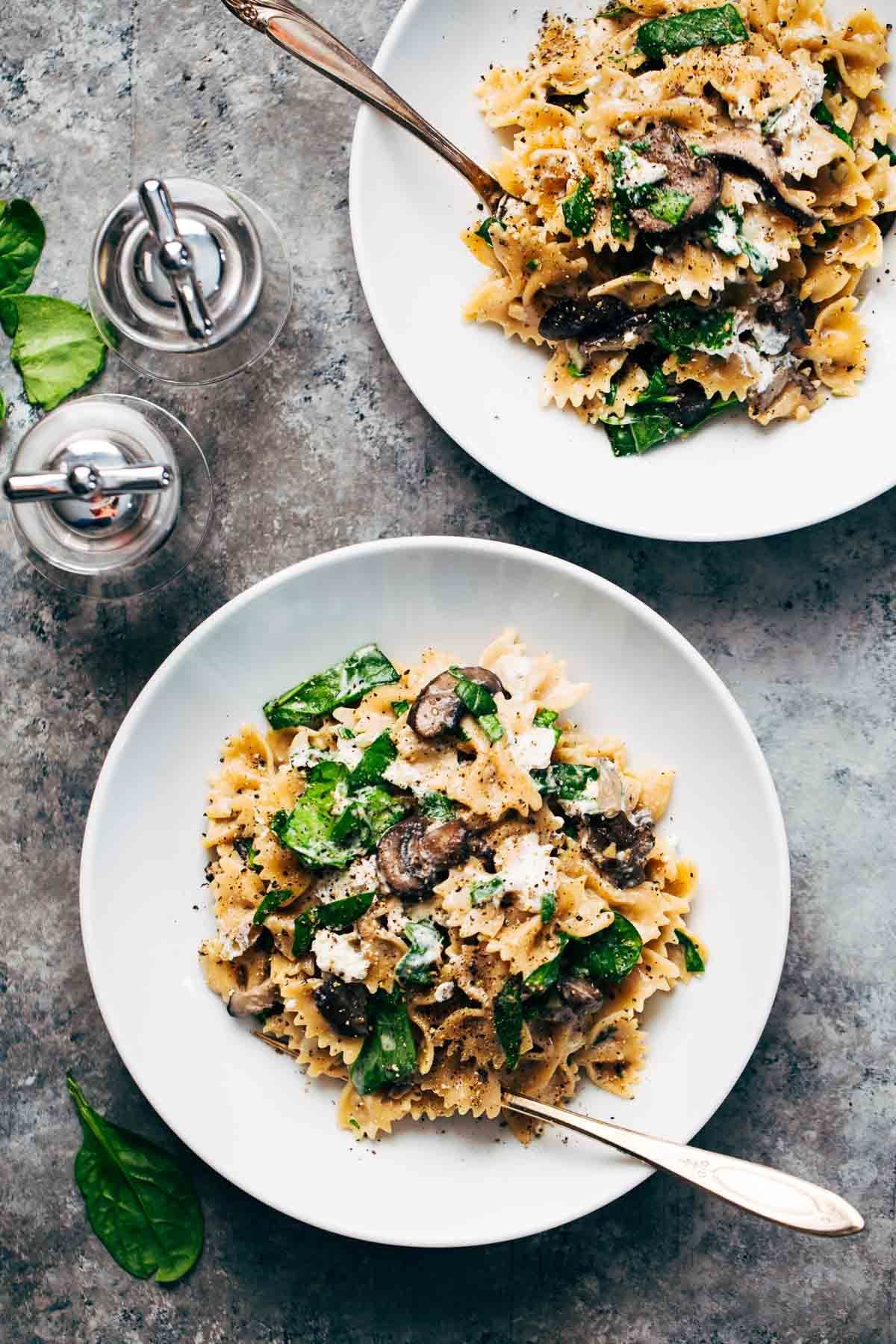 Date Night Mushroom Pasta with Goat Cheese – a simple, romantic meal involving white wine, mushrooms, spinach, pasta, and goat