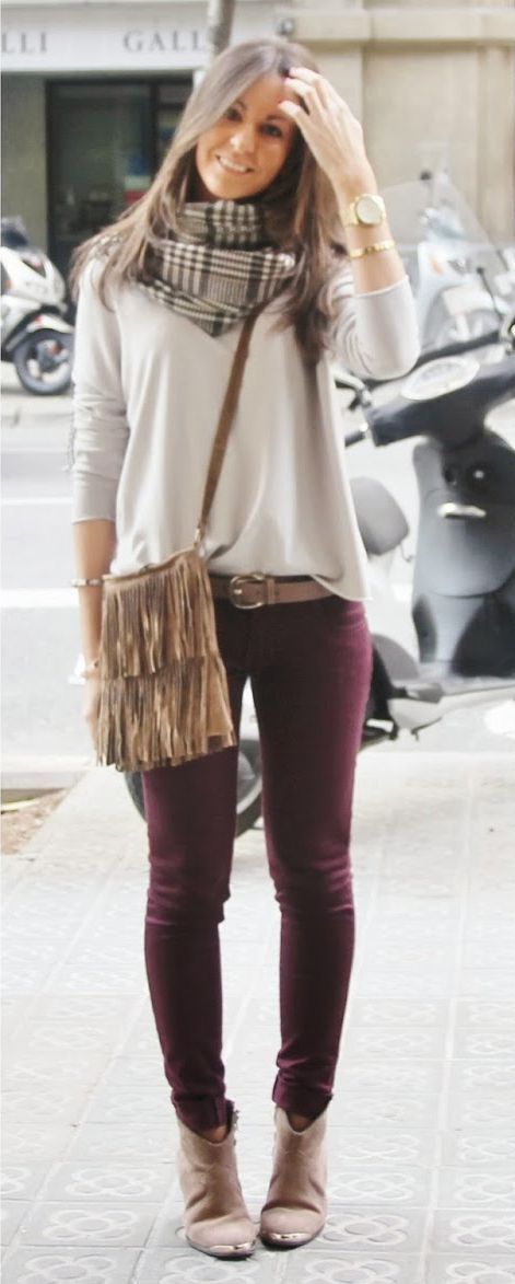 Fall look: white long sleeve, with printed scarf, maroon jeans, and nude/gold accessories.