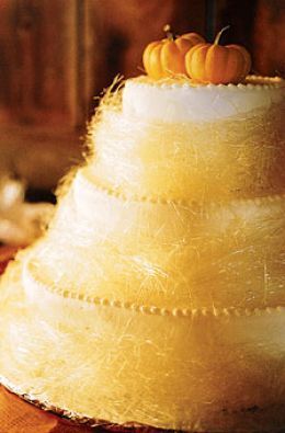 Fall wedding cake idea with spun sugar and mini pumpkin topper
