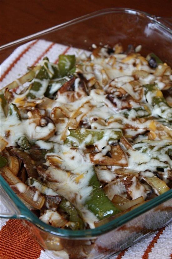 Lightly Smothered Chicken with onions, mushrooms, bell peppers, and mozzarella.