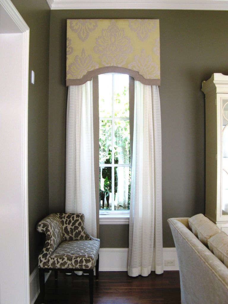 Love the cornice box with the matching edging on the white sheer curtains