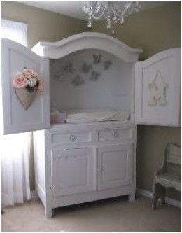 My sis did something similar for her baby’s nursery and it’s amazing!!! an old tv armoire turned into a changing station – great