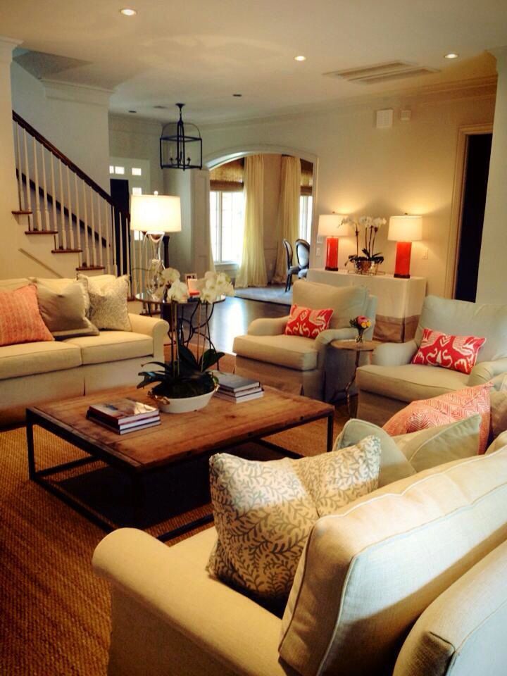 Nice furniture arrangement and like the rustic coffee table with more sophisticated sofas and chairs