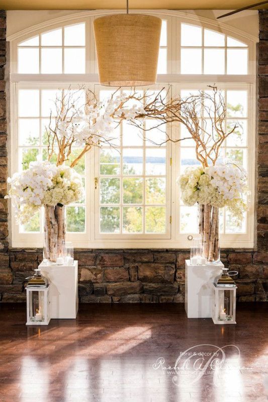 Rachel A. Clingen Wedding and Event Design, Branches create an archway with lovely white flower arrangements to the sides with