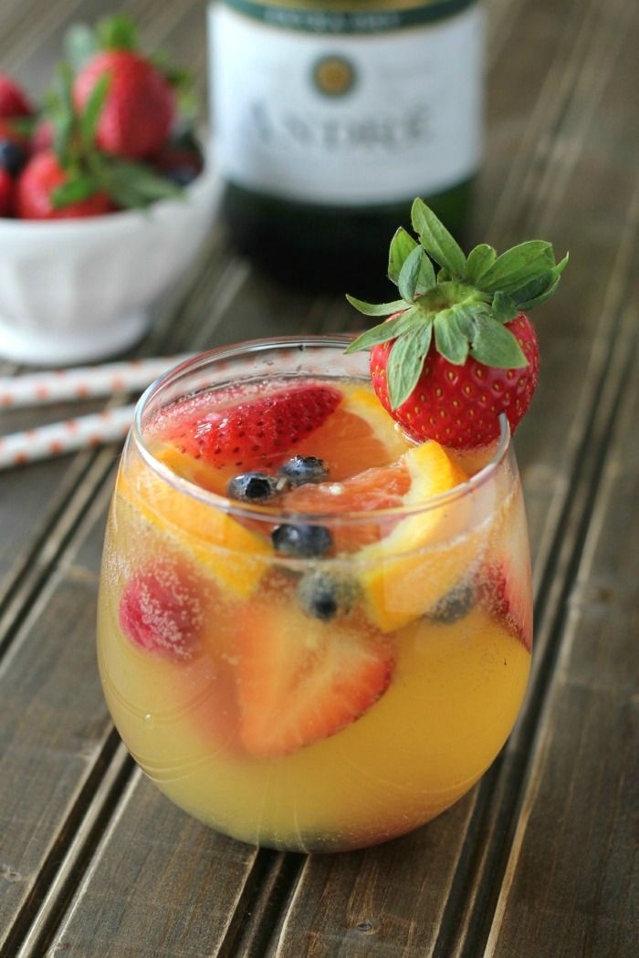 This is the best sangria! It’s made with tons of fresh fruit, white wine, champagne, and pineapple juice and has NO refined sugar!