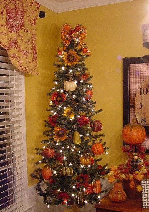 This is the year I make a Thanksgiving / Fall tree.  Will set up the artificial tree with only white lights and some fall ribbon