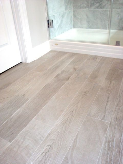 We have been loving the look of porcelain tiles that look like wide plank distressed wood for a while now. We are excited to