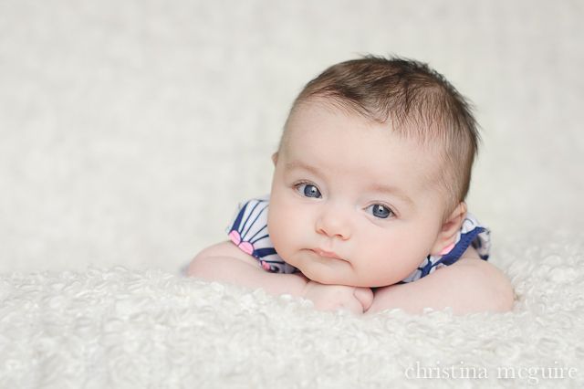 5 tips for photographing 3 month olds by Christina McGuire. Ellie will be 4 months but these still apply I think.