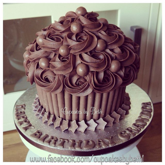 Chocolate Giant Cupcake decorated with Maltesers and Milky Way Magic Stars