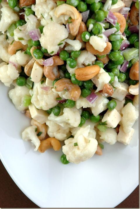 Crunchy Salad with Cauliflower, Peas, Celery, Red Onion, Roasted Cashews,Gouda Cheese and Topped with Buttermilk Ranch Dressing.