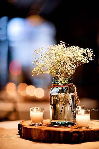 EXACTLY what I was thinking for the reception tables @Katie Boyd Baby’s Breath and Mason jar. Simple and beautiful.