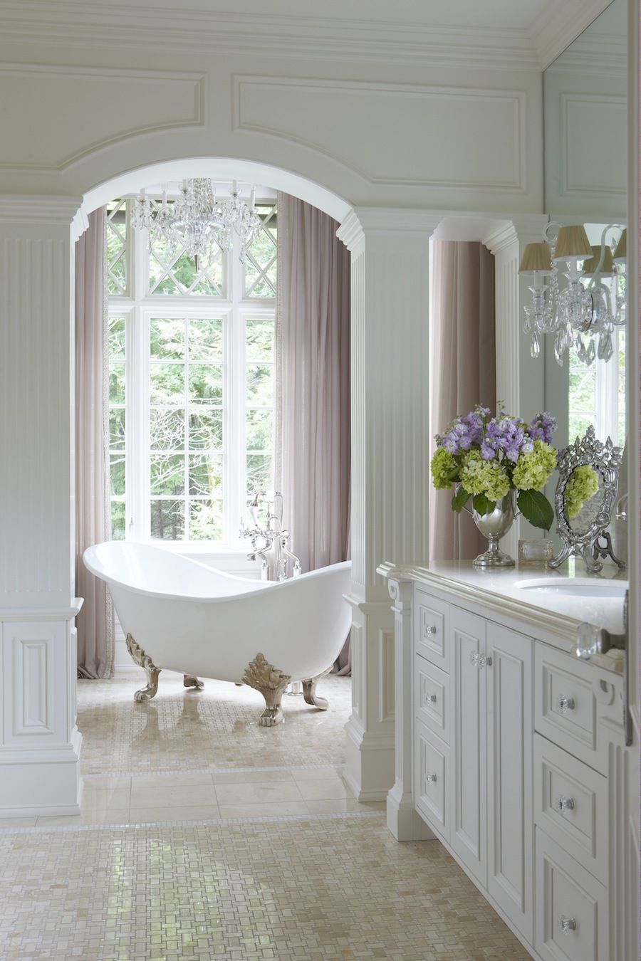 Fabulous & classic bathroom – This pretty claw foot tub sits in a niche with a lovely view!