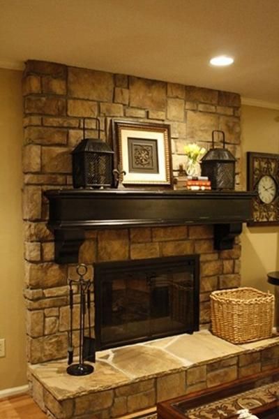 Fireplace Design Ideas 35 Photos.              I like the dark color and shape of mantle on the stone