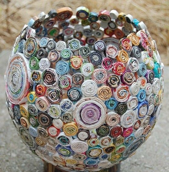 Great way to recycle old magazines! Just roll them up, glue to an inflated balloon, let it dry and pop the balloon.