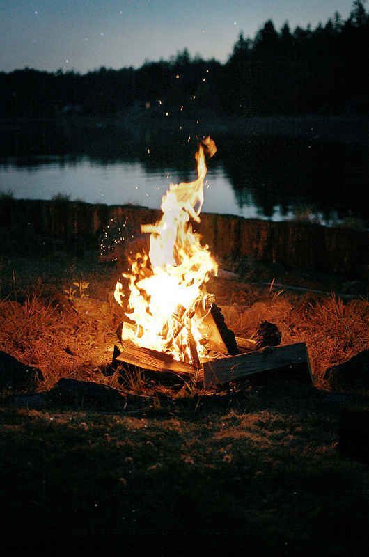 Hang out around a fire and drink whiskey. | 60 Things You Absolutely Have To Do This Summer