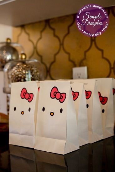 Hello kitty goodie bags – diy with white paper lunch bags- cute for a kids party!