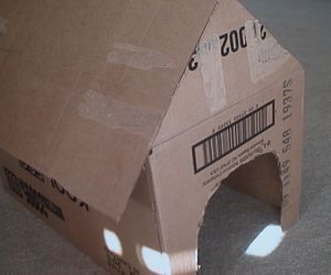 How to Make a Cardboard Doghouse.  I can think of so many ways I could use this in therapy