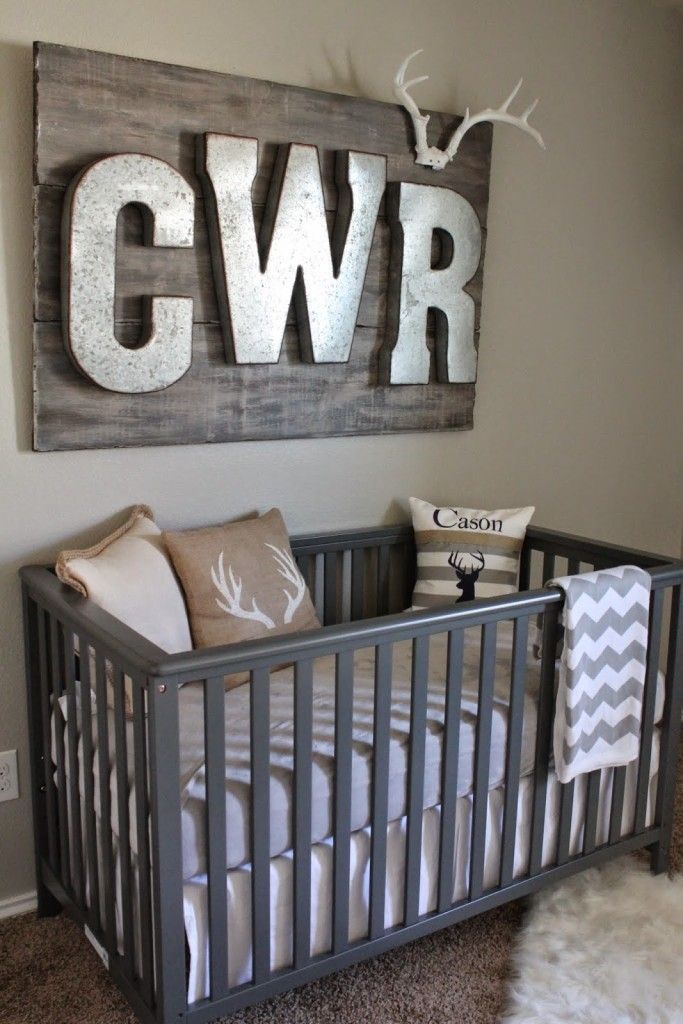 Hunting and Fishing Themed Nursery – we love the rustic look of the galvanized letters over the crib!