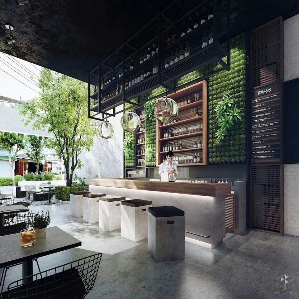 I like the greenery contrast that is portrayed here against the concrete and timber